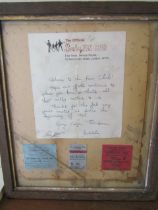 Beatles fan club letter and 3 concert ticket stubs together in a frame.