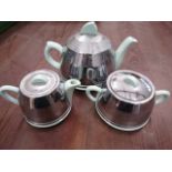 retro ceramic tea set with steel covers