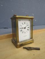 H.W. Bedford of Regent Street London brass carriage clock with key H12cm approx ticking and time