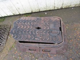 A manhole cover and base