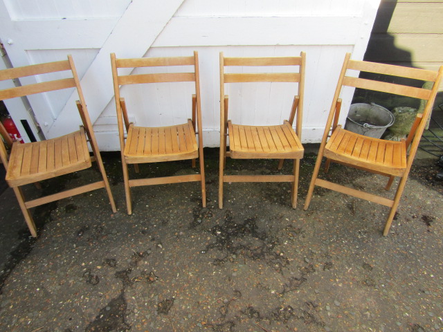 4 folding wooden chairs