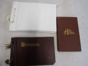 A quantity of postcards, 2 photo albums and a hand written note book