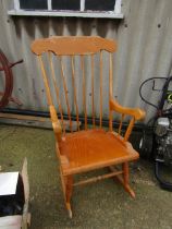 A pine rocking chair