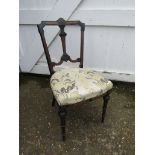 Ebonised chair with upholstered seat