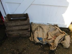 2 apple boxes and a quantity hessian sacks