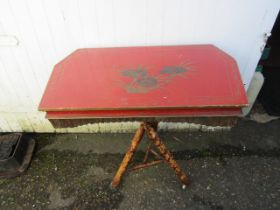 Victorian? painted bamboo table on porcelain castors