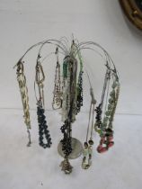 Quantity costume jewellery on a stand