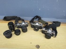 Canon and Pentax cameras and lenses etc