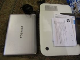 A Toshiba lap top and a HP printer