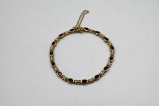9ct gold, diamond and sapphire bracelet, with safety chain total weight 7.55g
