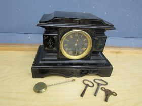 Black slate mantel clock with pendulum and key
