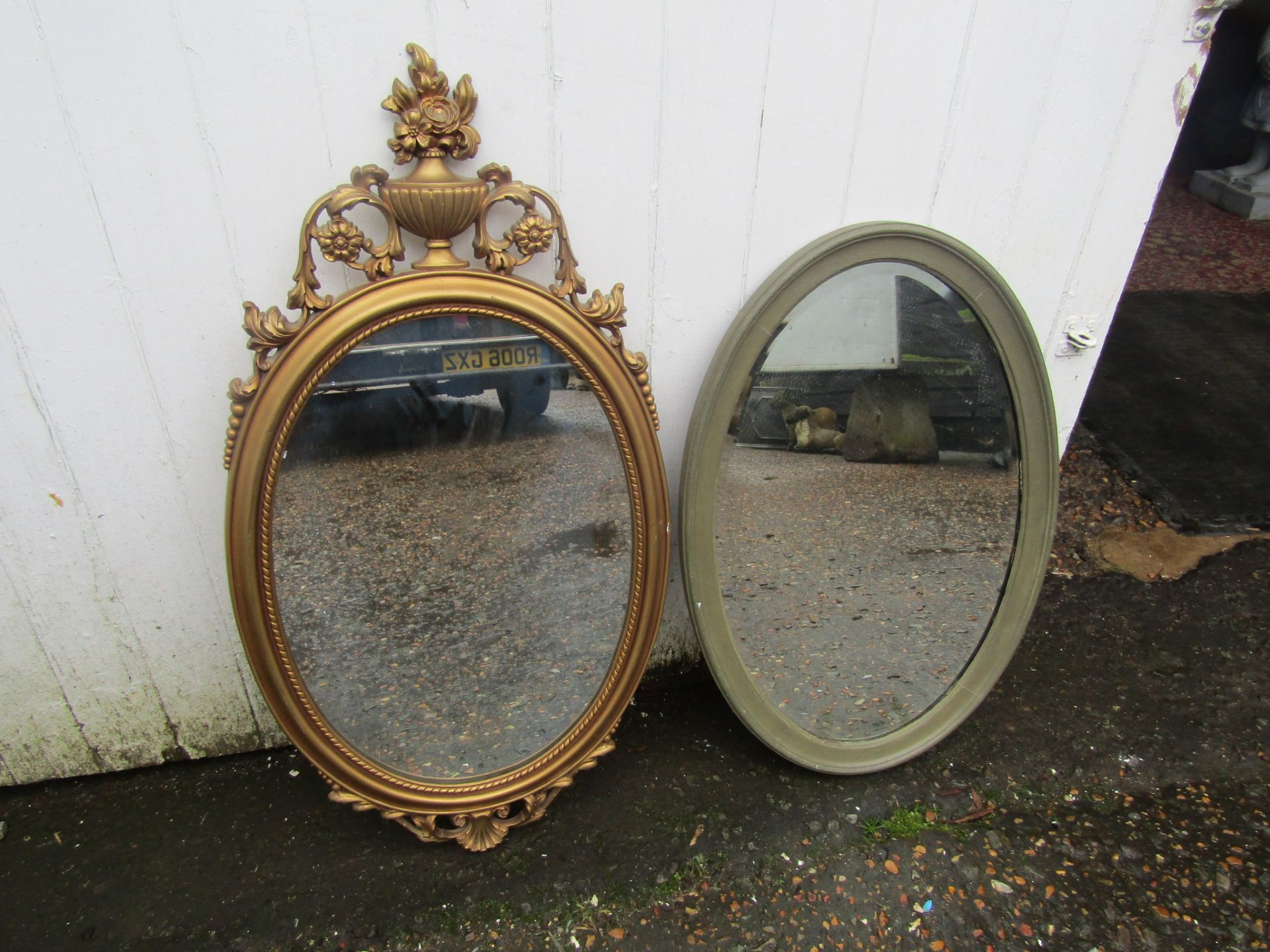 2 Oval wall mirrors. Largest H80cm approx