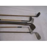 Quantity vintage golf clubs