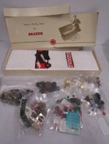 Braxon sheet in box and a quantity of buttons