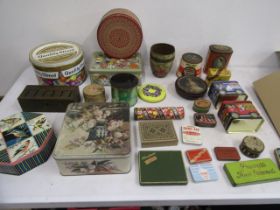 A collection of vintage tins and an old Norfolk Christmas pudding!