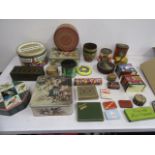 A collection of vintage tins and an old Norfolk Christmas pudding!