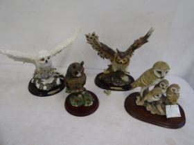 4 owl figurines one has damaged foot- part is present