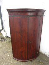 A Georgian mahogany corner cabinet 110cmH 68cmW