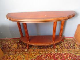 Console table with brass feet