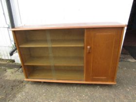 Mid century bookcase with glazed doors and cupboard