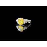 Yellow oval cut Sapphire and Diamond platinum ring, size N