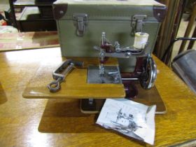 The Essex miniature sewing machine in case