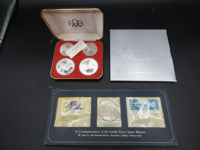 Space museum coin set, 1972 Olympic coin set and a Strike Millennium coin