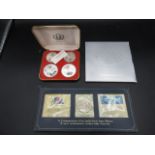 Space museum coin set, 1972 Olympic coin set and a Strike Millennium coin