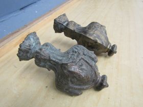 Pair of ornate antique clock weights