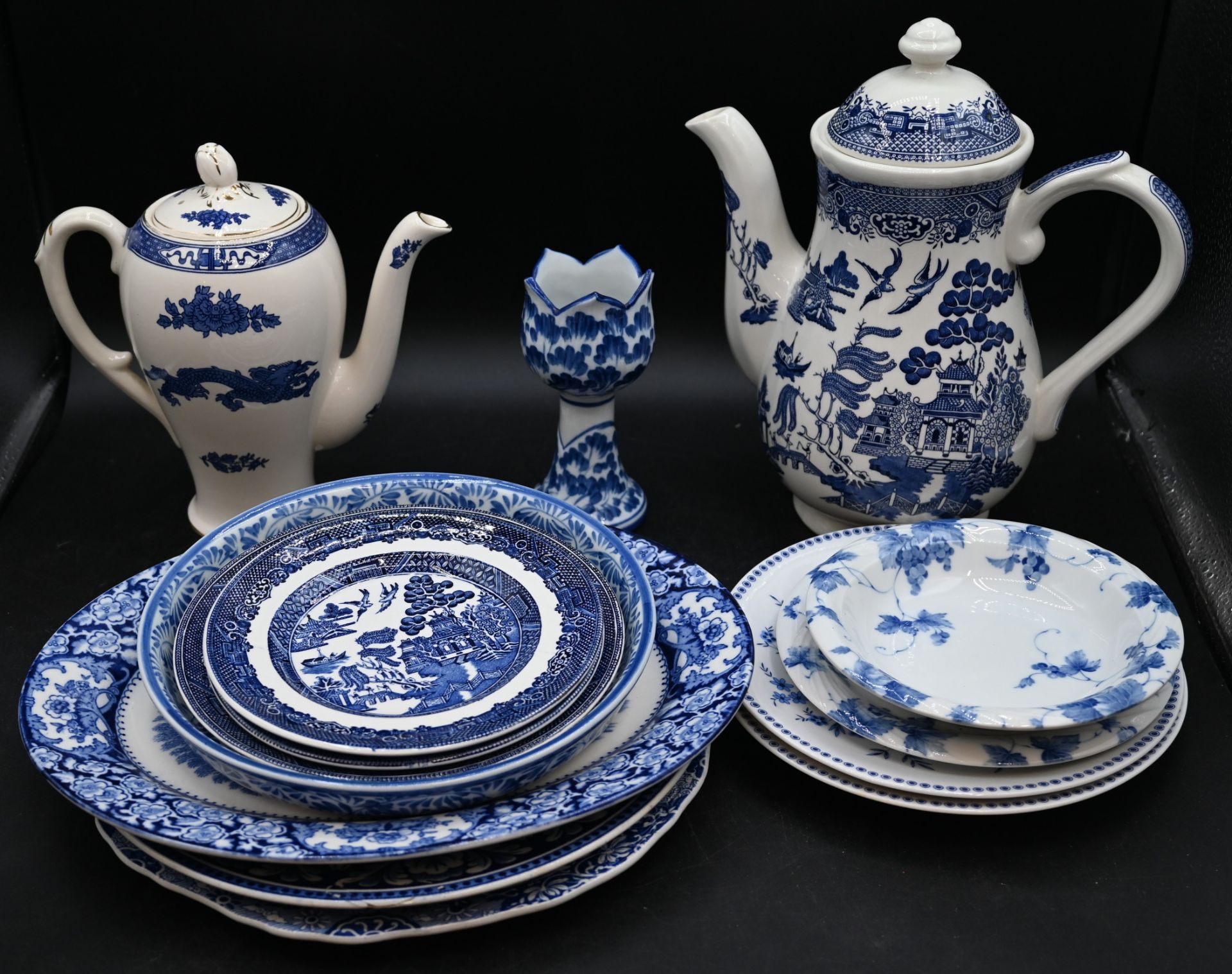 Assorted blue and white china to include Churchill Willow, Royal Cauldon Dragon, Spode to include