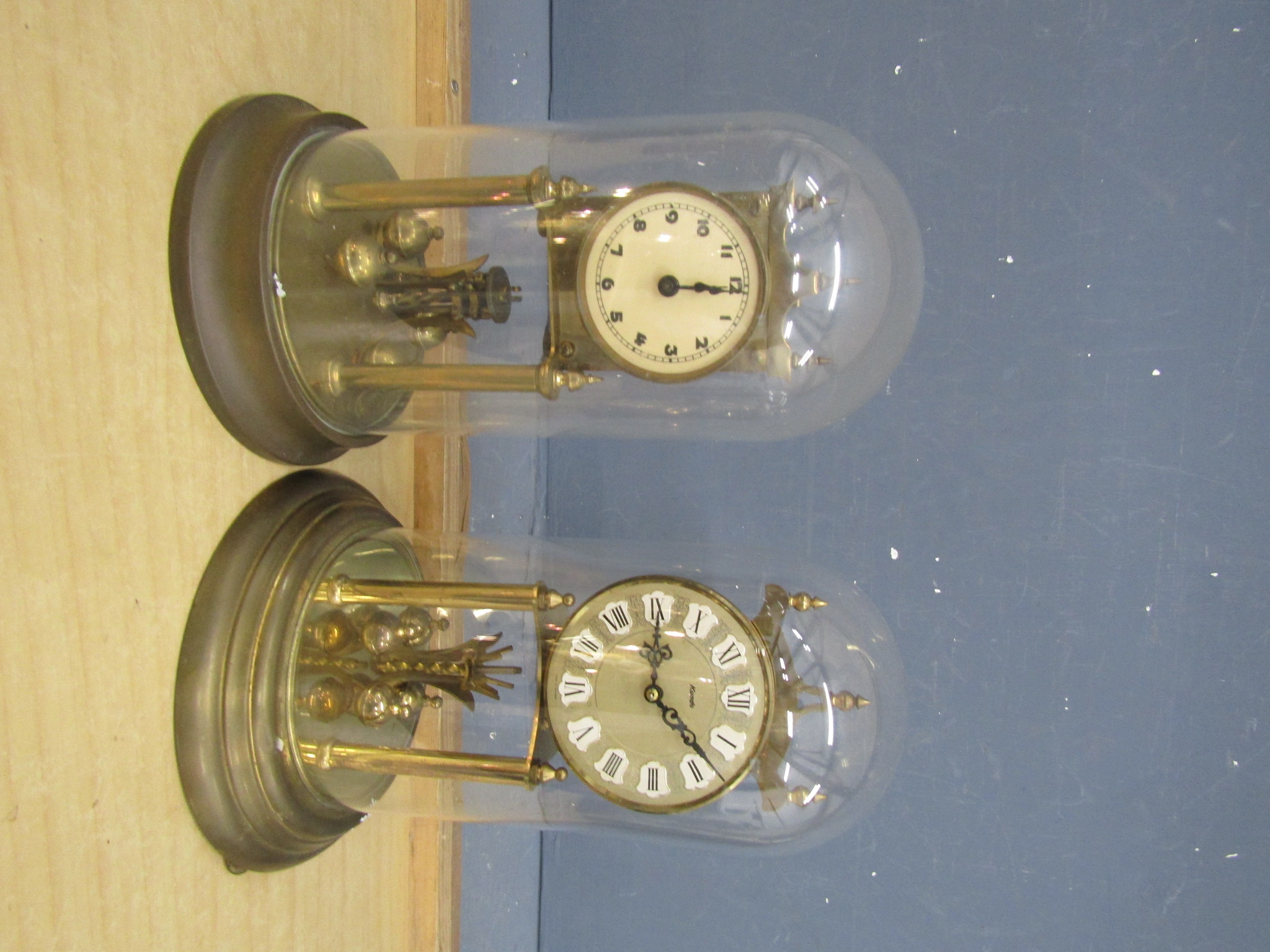 1930's Brass anniversary clock and Kundo anniversary clock, both with domes