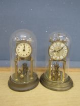 1930's Brass anniversary clock and Kundo anniversary clock, both with domes