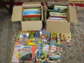 An assortment of vintage childrens books and annuals