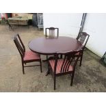 Extending dining table with 4 upholstered chairs