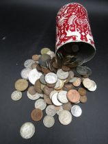 Mixed British and Foreign coins in a tin