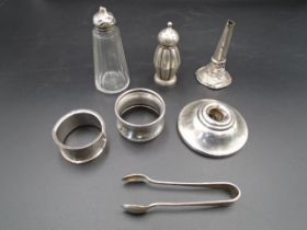 Collection of Silver items - sugar tongs Birmingham 1922, base of a candlestick Birmingham 1919,