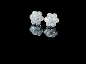 Pair of diamond daisy cluster earring set in 18k white gold 2.02ct 1.5cm width approx.