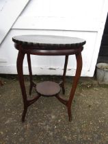 A pie crust occasional table