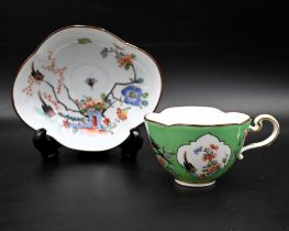 Meissen kakiemon-style four pass or quatrefoil cup and saucer decorated in the Japanese style with