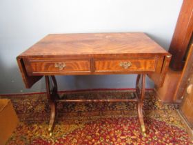 An inlaid sofa table on casters 89cmW extended 146cmW