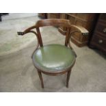 A bentwood penny seat chair with leather upholstered seat