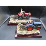 2 Juliano collection tractor ornaments. dogs tail broken on one and a chip on other