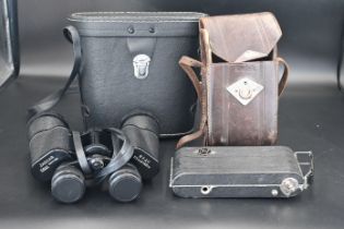 Jaguar binoculars in case together with a Kodak 620film camera in case