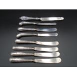 7 x silver handled knives, and 1 x silver hallmarked on blade (largest knife) London 1822 George