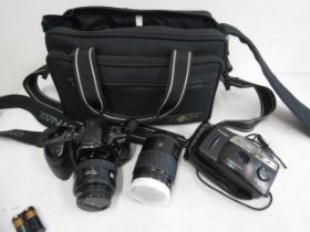 Minolta camera and lens in carry bag plus one other