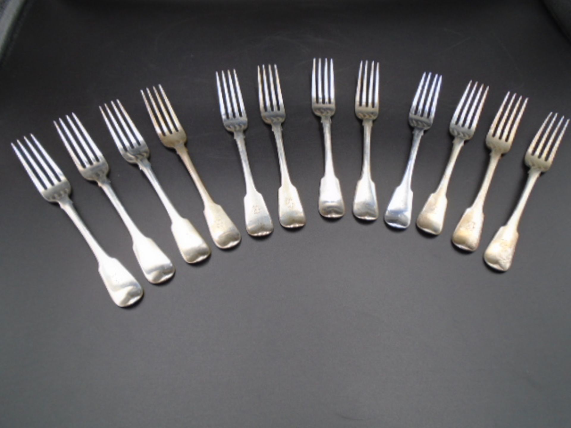 Set of 12 George III 'Fiddle' pattern forks - Hallmarked London 1817 by William Eley and William