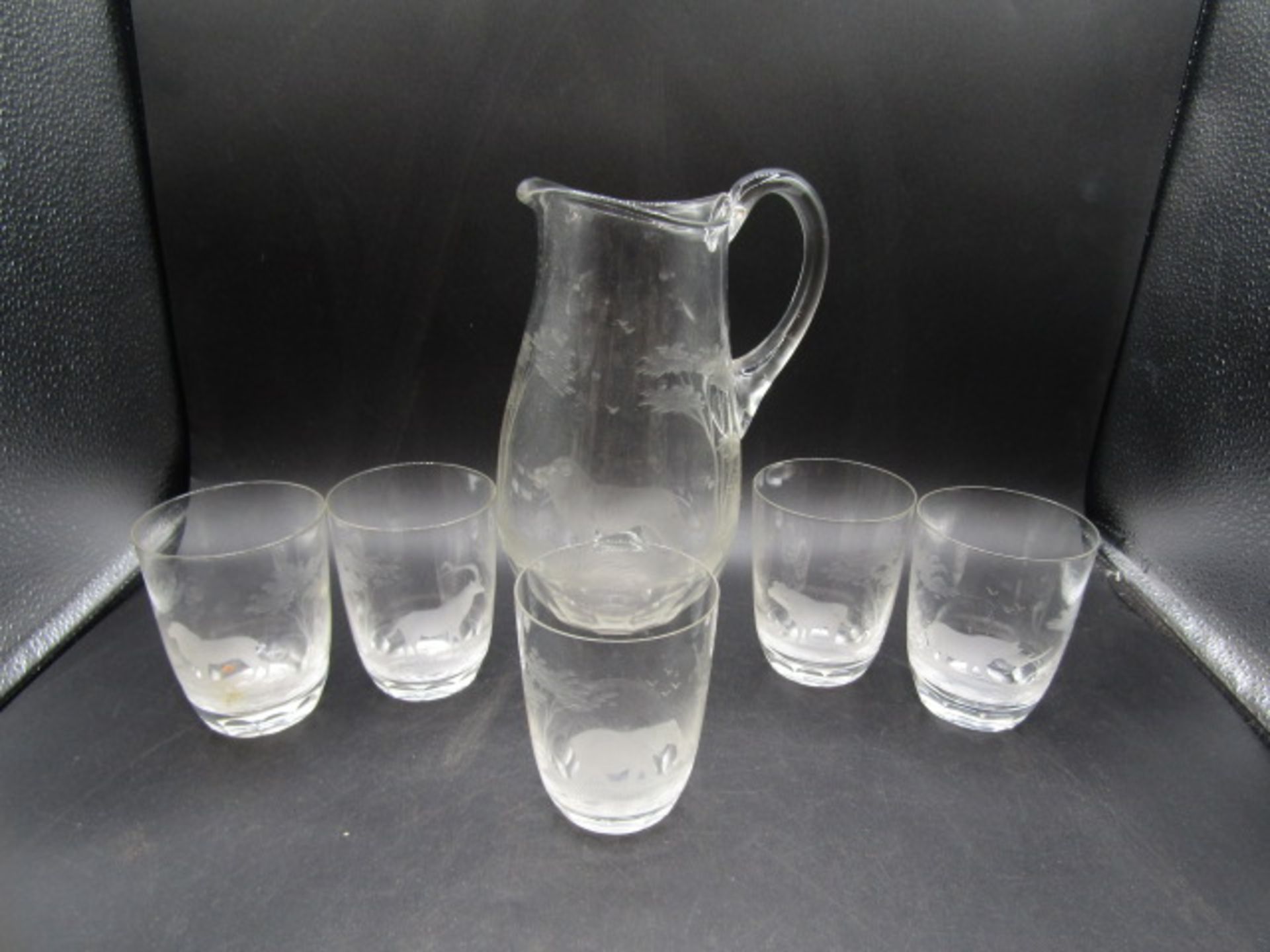 A Roland Ward 'Safari' pattern etched lemonade set comprising of an ovoid form jug with lion etching