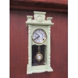 Striking Vienna regulator wall clock with key and pendulum