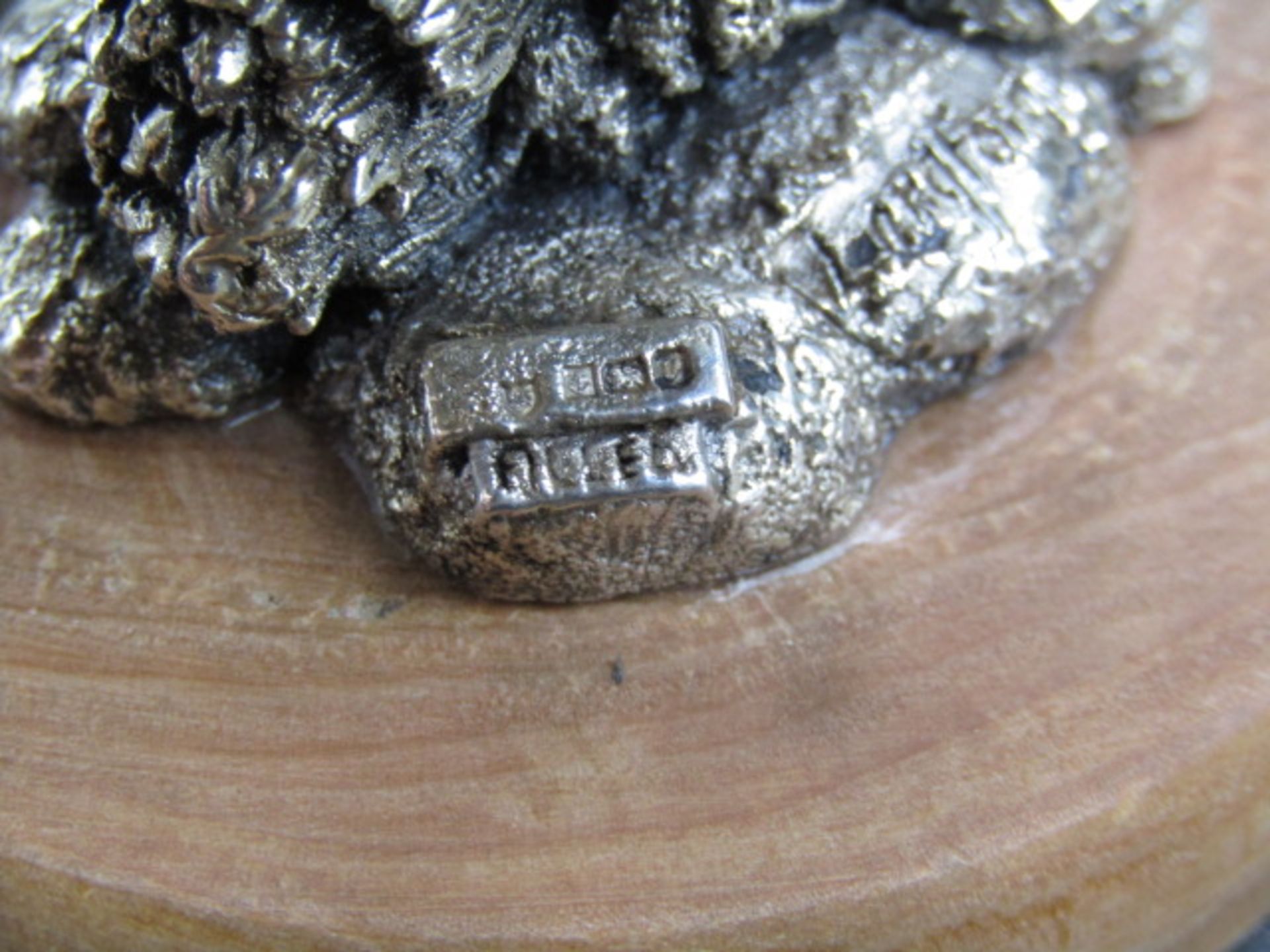 A silver owl on a wooden plinth, stamped with hallmarks and 'Langford  CA 1992' on the base 12cmH - Image 6 of 6