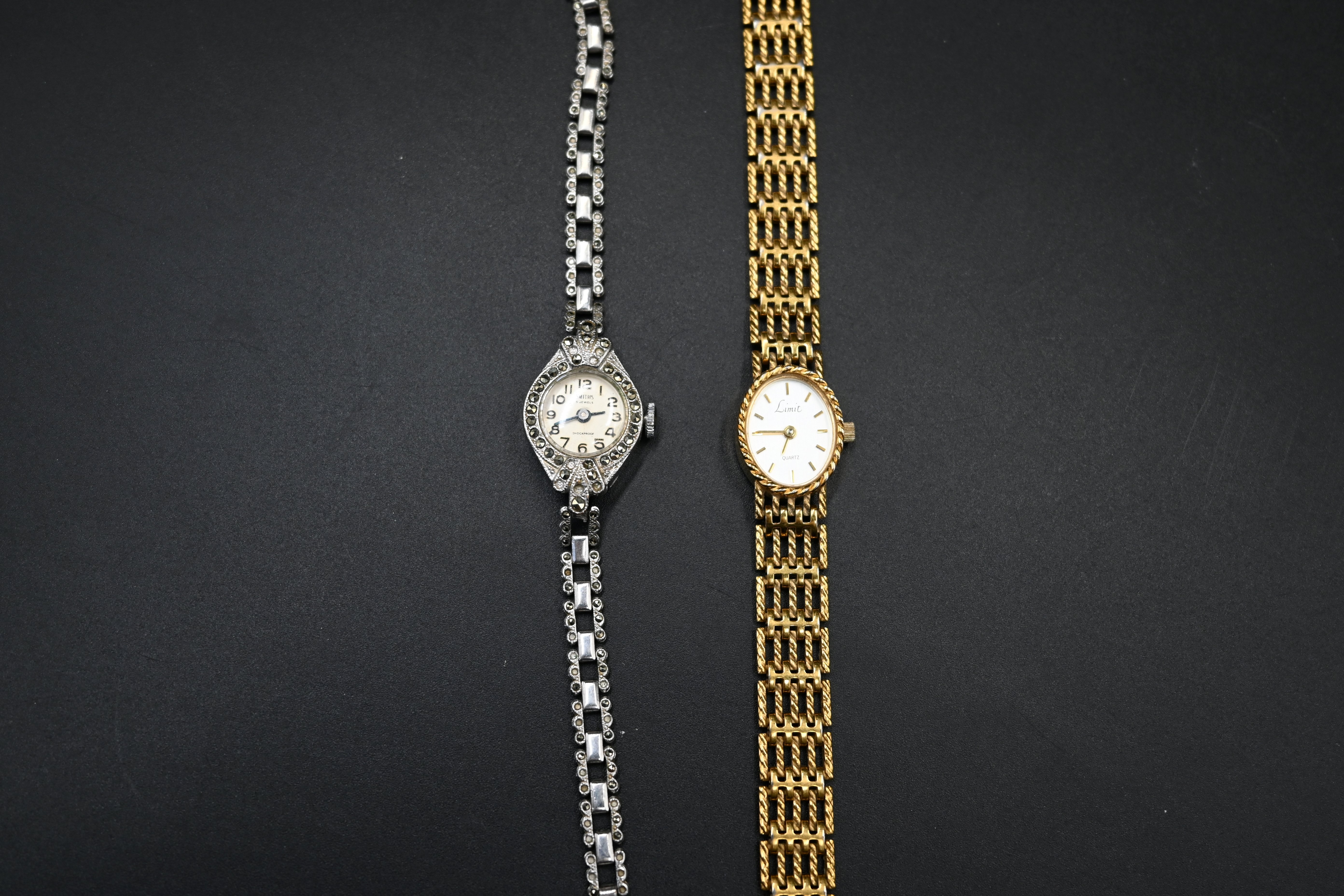Smiths 5 jewels ladies marcasite art deco styly cocktail watch together with a Limit quartz watch